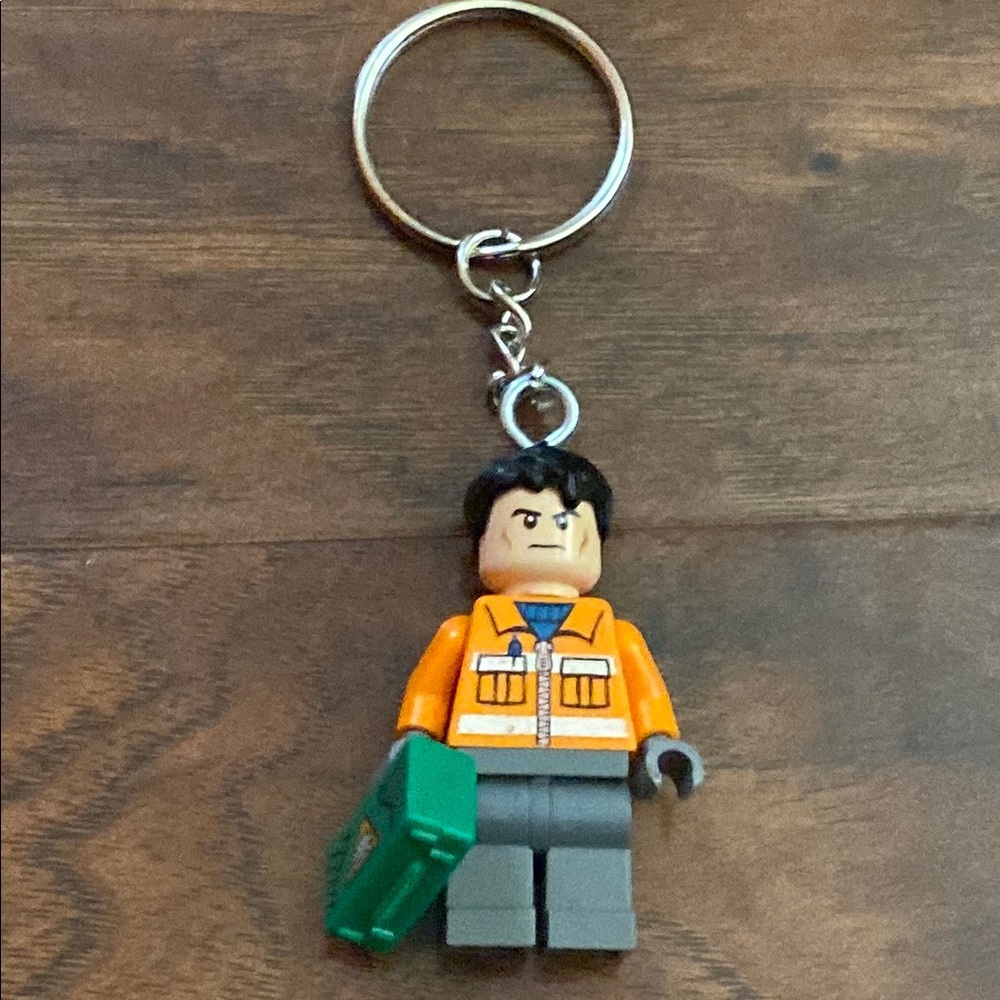 LEGO Keychain with Orange Jacket and Green Case